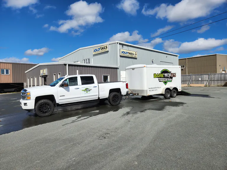 Bare Bones Pressure Wash truck and service trailer outside Jollytails
