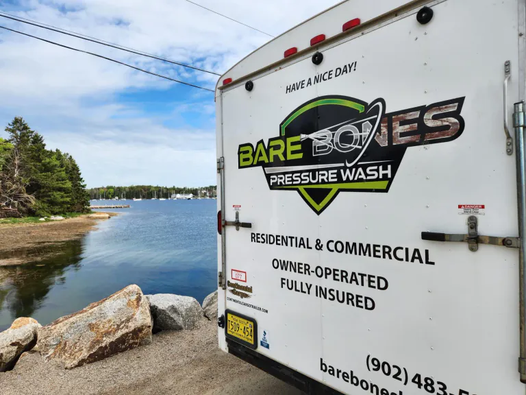 Bare Bones mobile service trailer beside the Nova Scotia waterfront