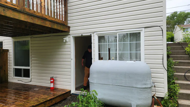 The same rear house exterior clean after washing